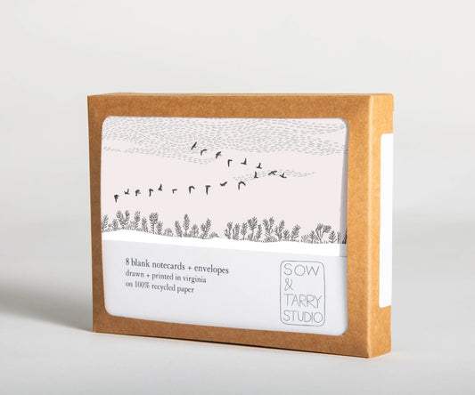 Hand-drawn geese in flight over a snowy prairie, printed on blank notecards. Uncoated, recycled paper.