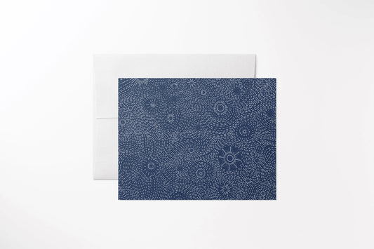 Blank notecard with a hand-drawn navy blue starry night cover on recycled, uncoated paper. With a matching white envelope.