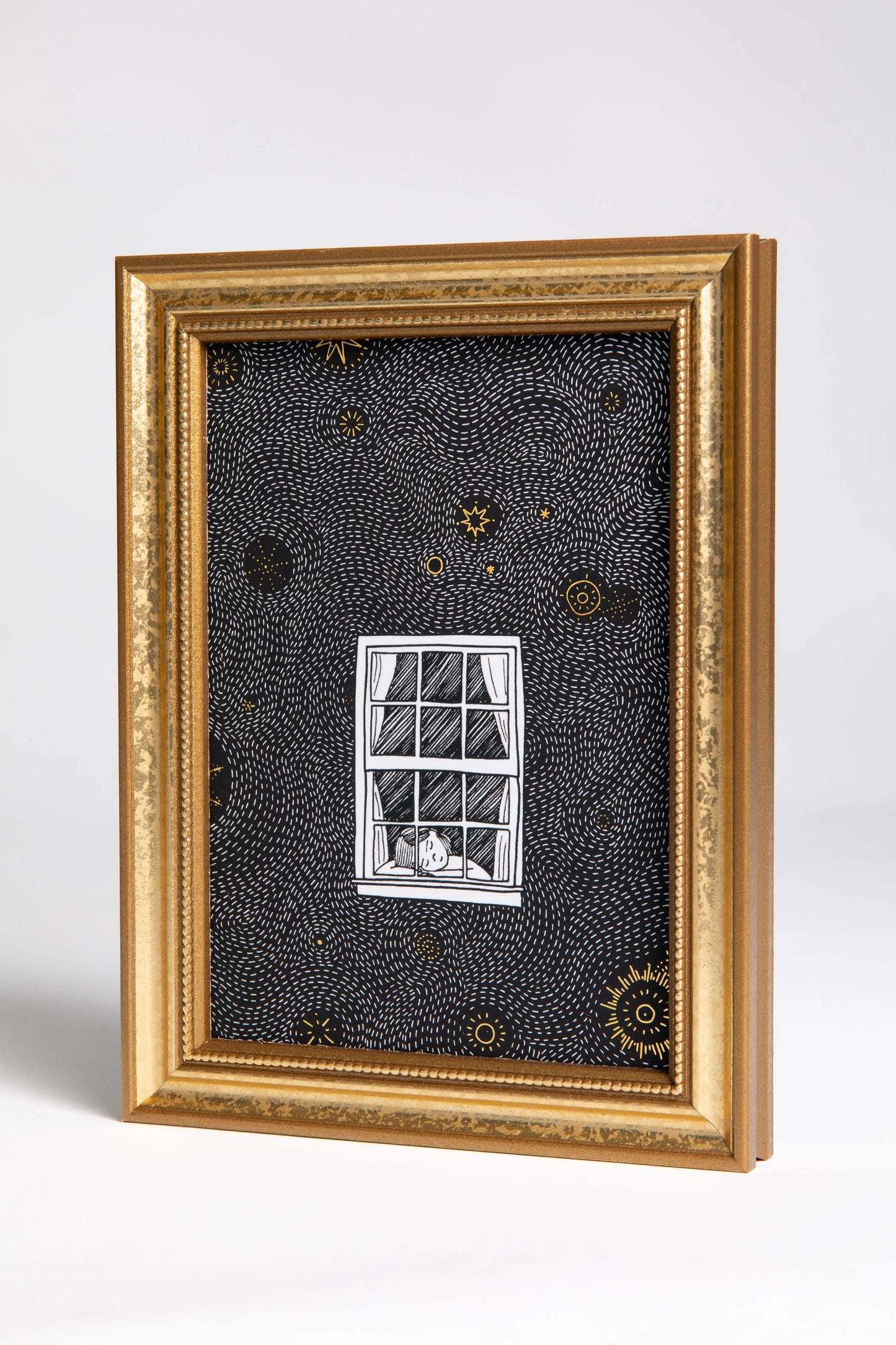 Gold-foil starry night illustration framed in American-made wood.